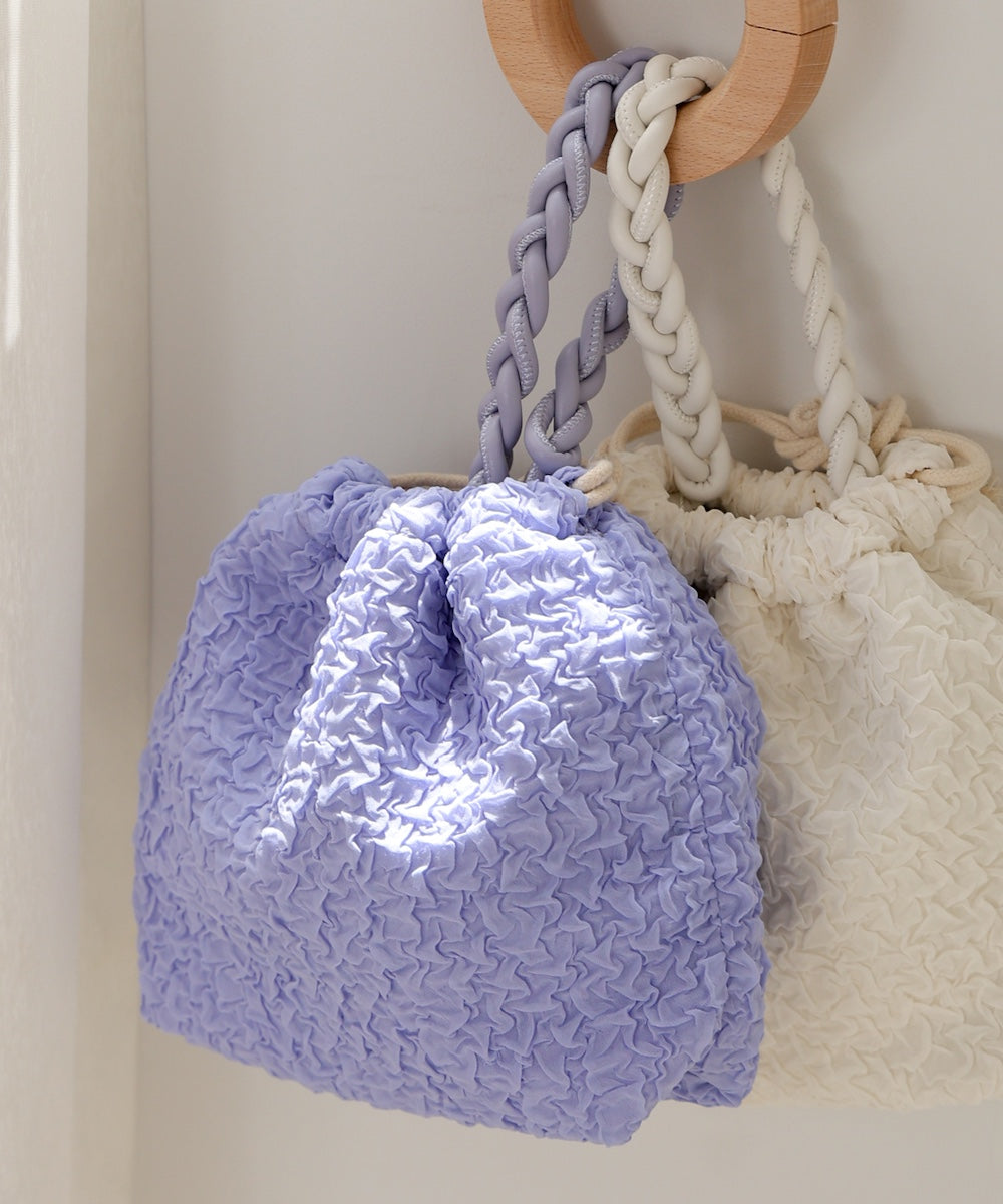 Knitted handle drawstring bag