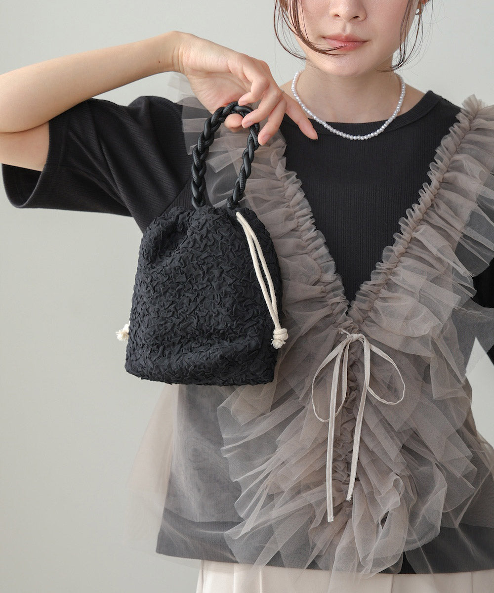 Knitted handle drawstring bag